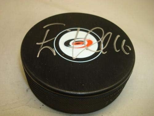 Елиас Линдхольм подписа хокей шайба Каролина хърикейнс с автограф 1Б - за Миене на НХЛ с автограф